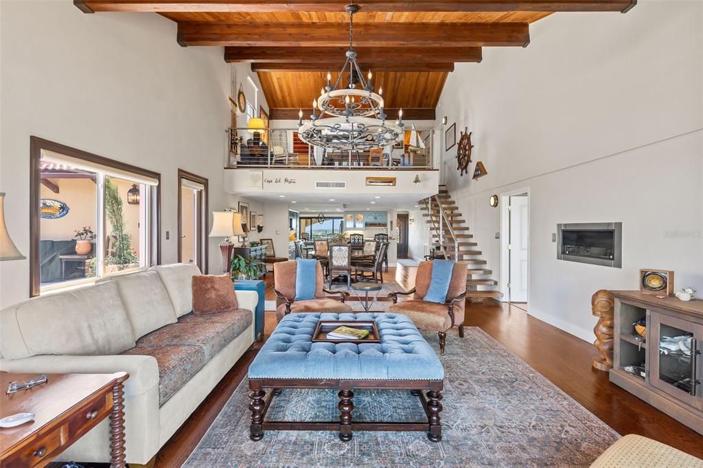 Chandelier, Dining room, Interior, Living room, Recessed Lighting, Wooden Beams, Wooden Ceilings, Wood Texture Flooring