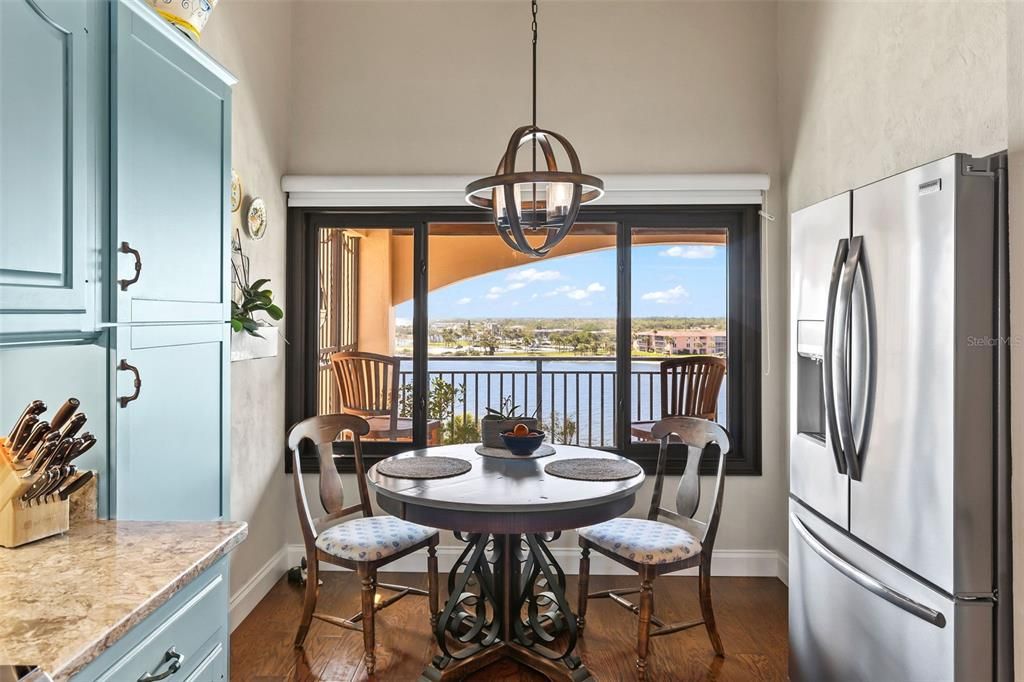 Dining room, Interior, Kitchen, Pendant Lights, Stainless Steel Appliances, Water, Wood Texture Flooring