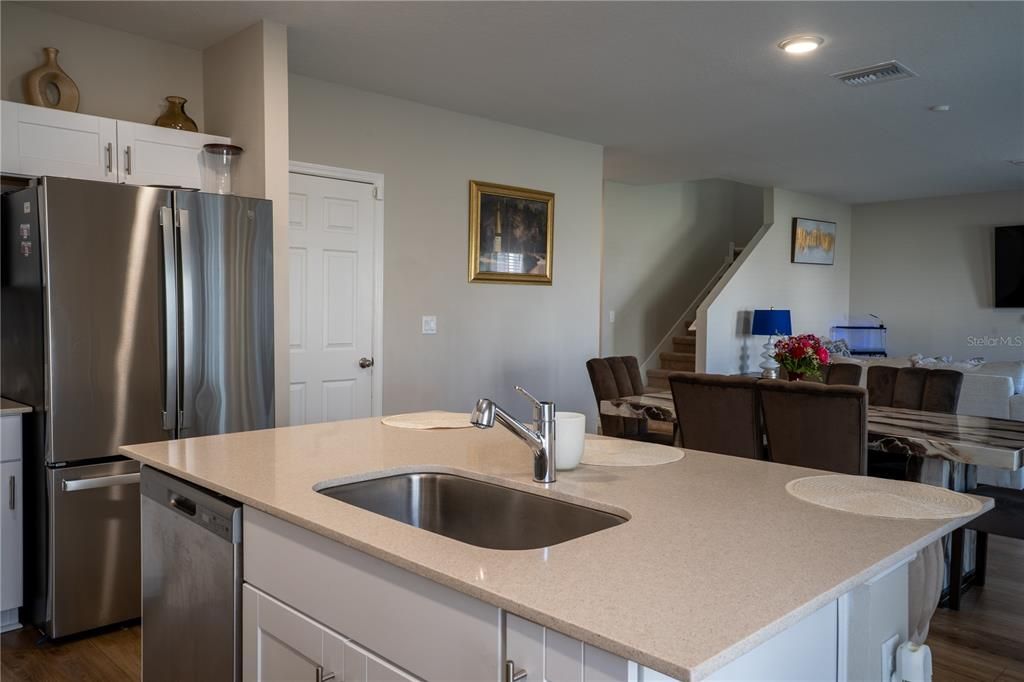 Dining room, Interior, Kitchen, Recessed Lighting, Stainless Steel Appliances, Wood Texture Flooring