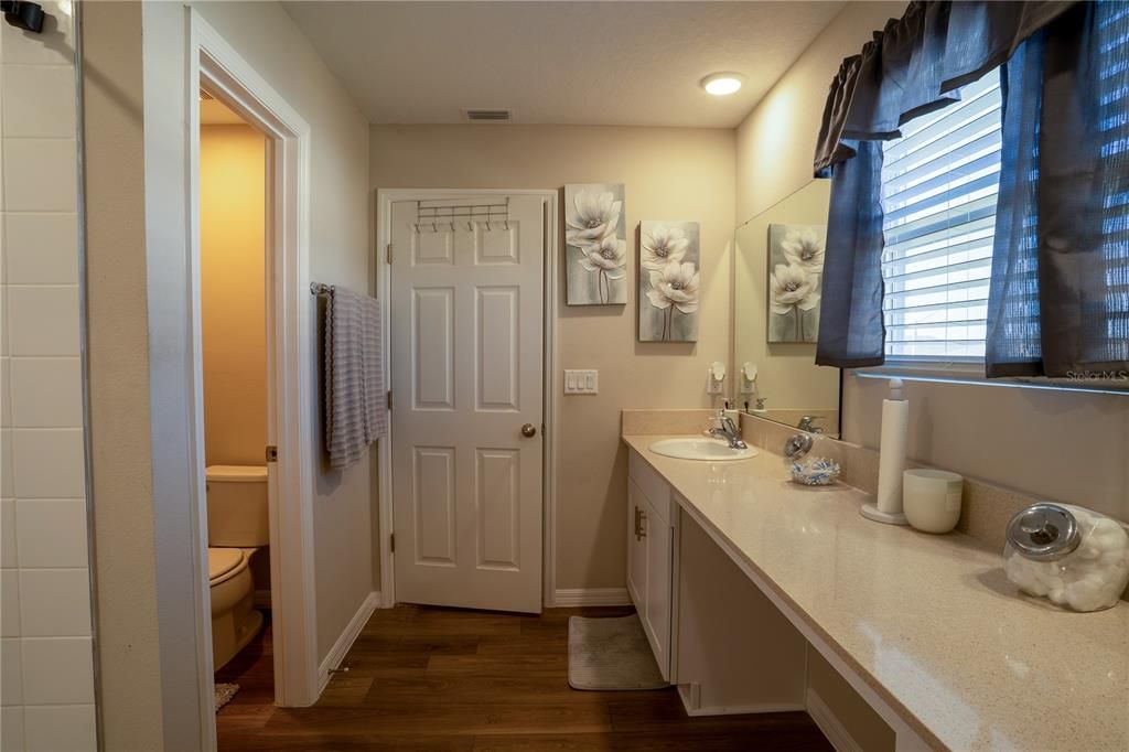 Bathroom, Dual Sink Vanities, Interior, Recessed Lighting, Wood Texture Flooring