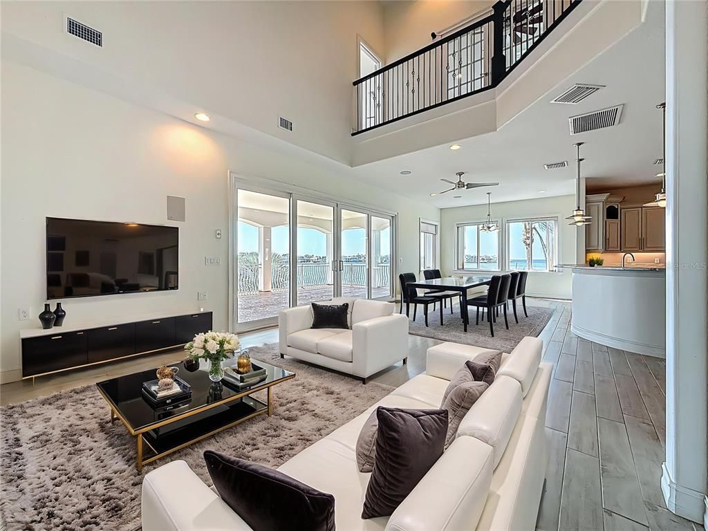 Dining room, Interior, Living room, Pendant Lights, Recessed Lighting, Water, Wood Texture Flooring