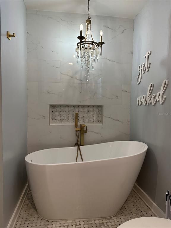 Bathroom, Free Standing Baths, Interior, Marble Walls, Pendant Lights