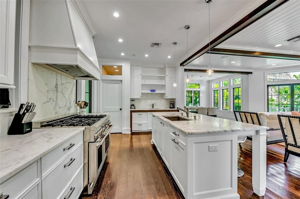 Interior, Kitchen, Marble Walls, Pendant Lights, Recessed Lighting, Wood Texture Flooring
