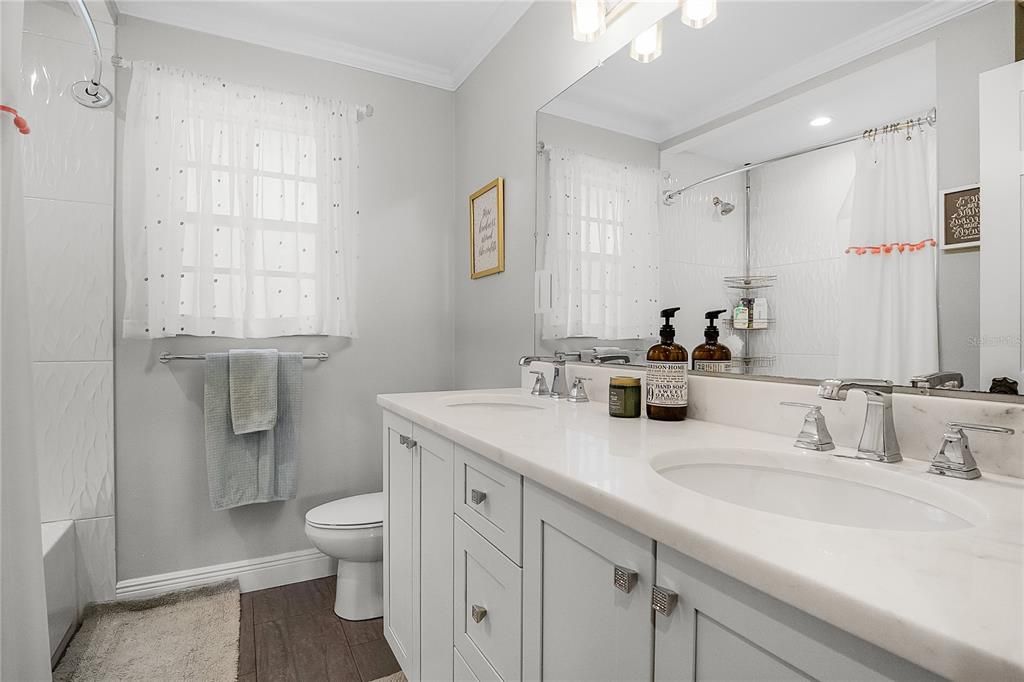 Bathroom, Dual Sink Vanities, Interior, Recessed Lighting, Wood Texture Flooring