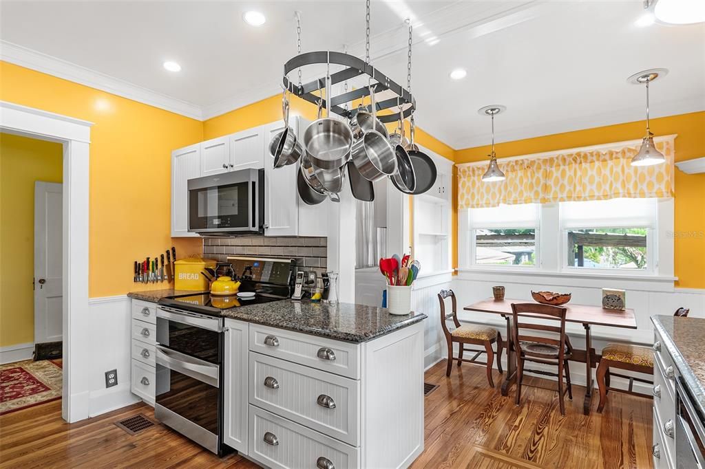 Dining room, Interior, Kitchen, Pendant Lights, Recessed Lighting, Stainless Steel Appliances, Wood Texture Flooring