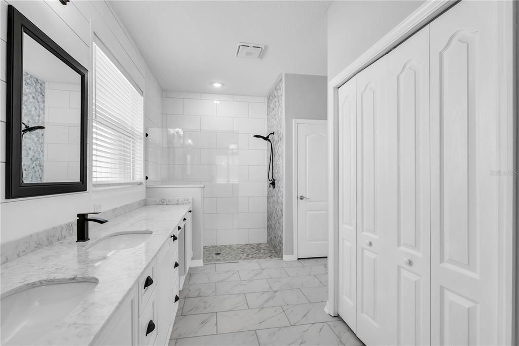 Bathroom, Dual Sink Vanities, Glass Shower, Interior, Marble, Recessed Lighting