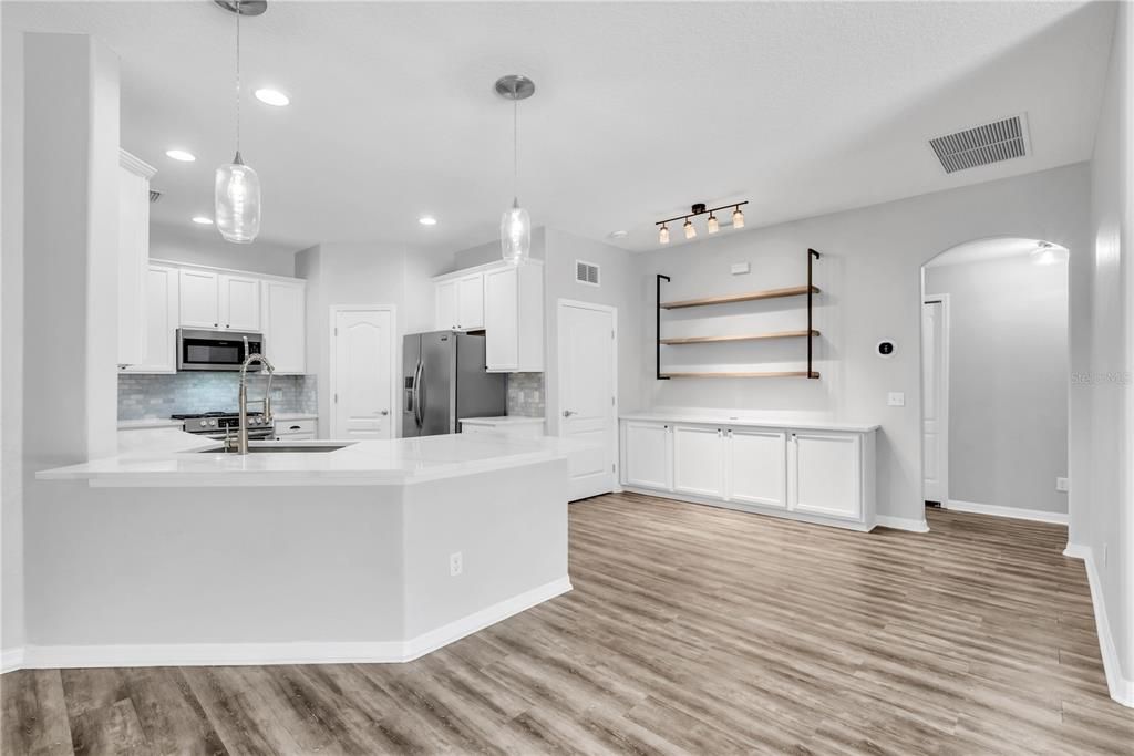 Interior, Kitchen, Pendant Lights, Recessed Lighting, Stainless Steel Appliances, Wood Texture Flooring