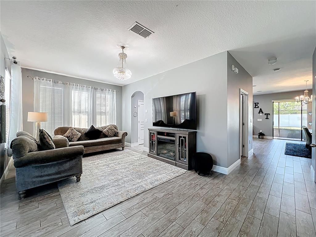 Chandelier, Interior, Living room, Pendant Lights, Wood Texture Flooring