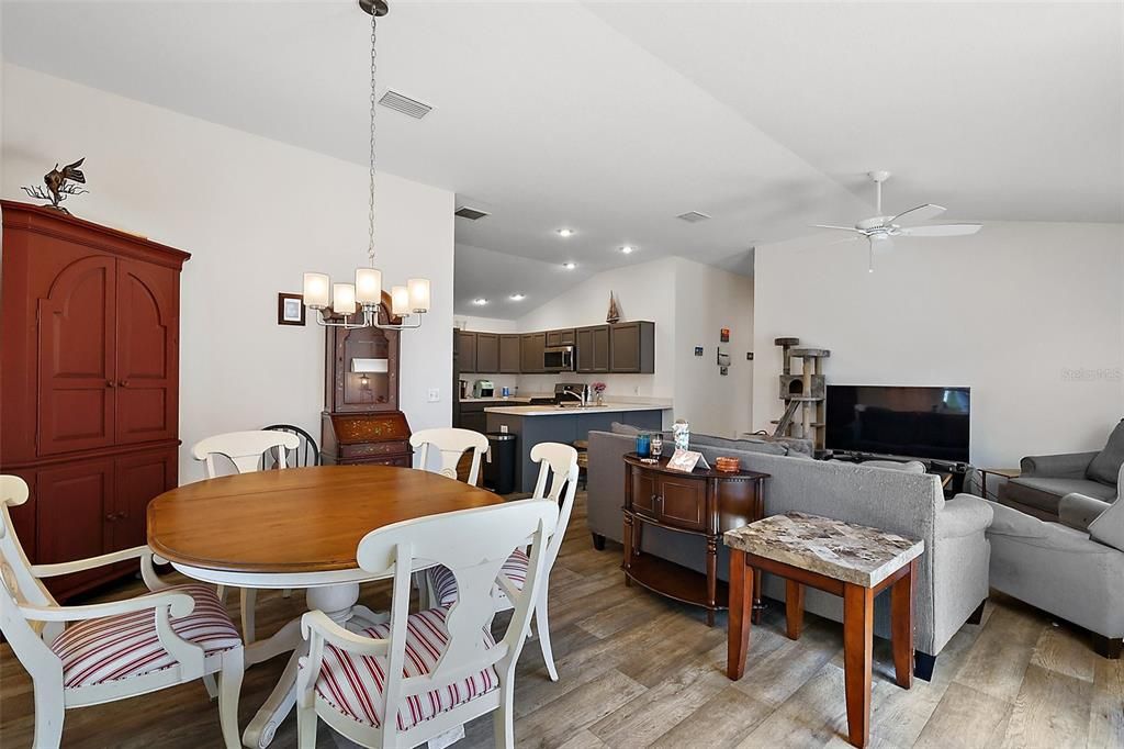 Chandelier, Dining room, Interior, Kitchen, Living room, Recessed Lighting, Wood Texture Flooring