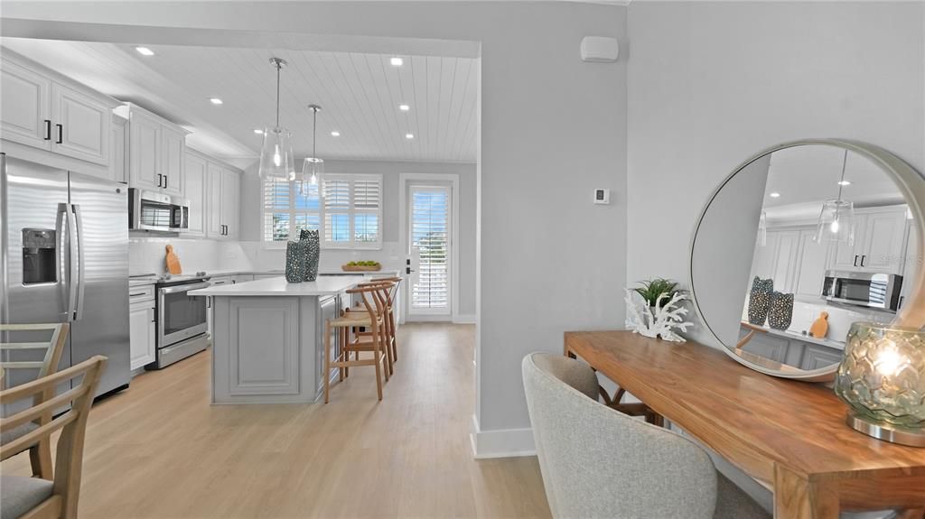 Dining room, Interior, Kitchen, Pendant Lights, Recessed Lighting, Stainless Steel Appliances, Wood Texture Flooring