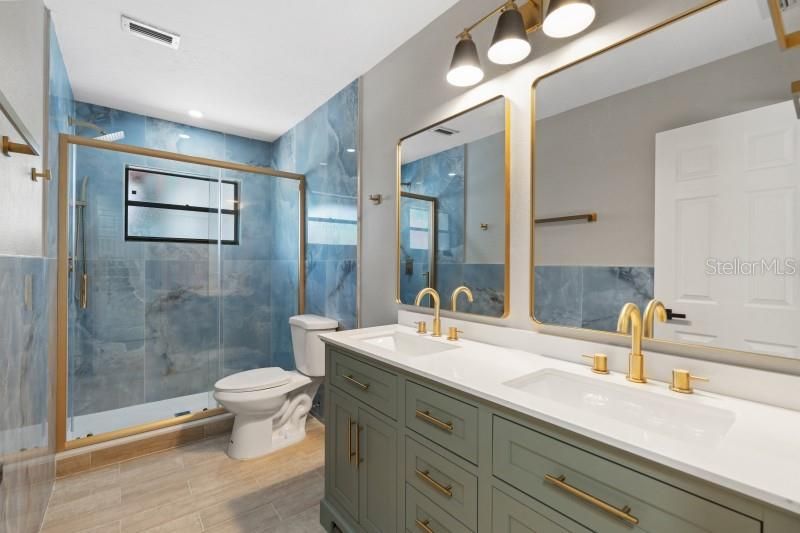 Bathroom, Dual Sink Vanities, Glass Shower, Interior, Recessed Lighting, Wood Texture Flooring