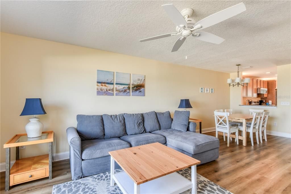 Chandelier, Dining room, Interior, Kitchen, Living room, Recessed Lighting, Wood Texture Flooring