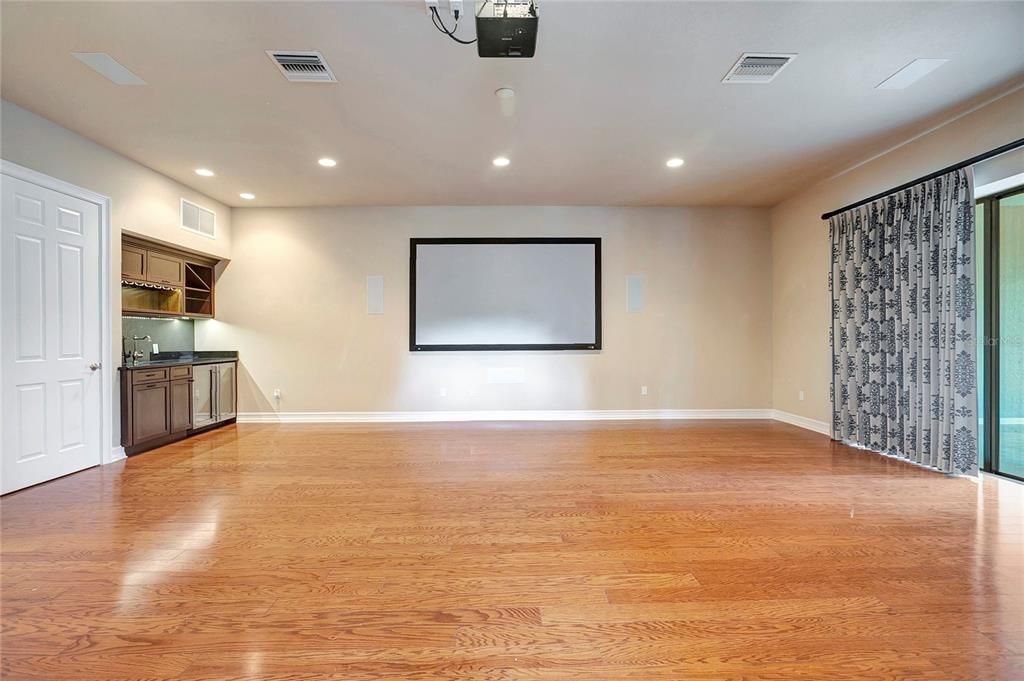 Empty room, Interior, Projection Screen, Recessed Lighting, Wood Texture Flooring