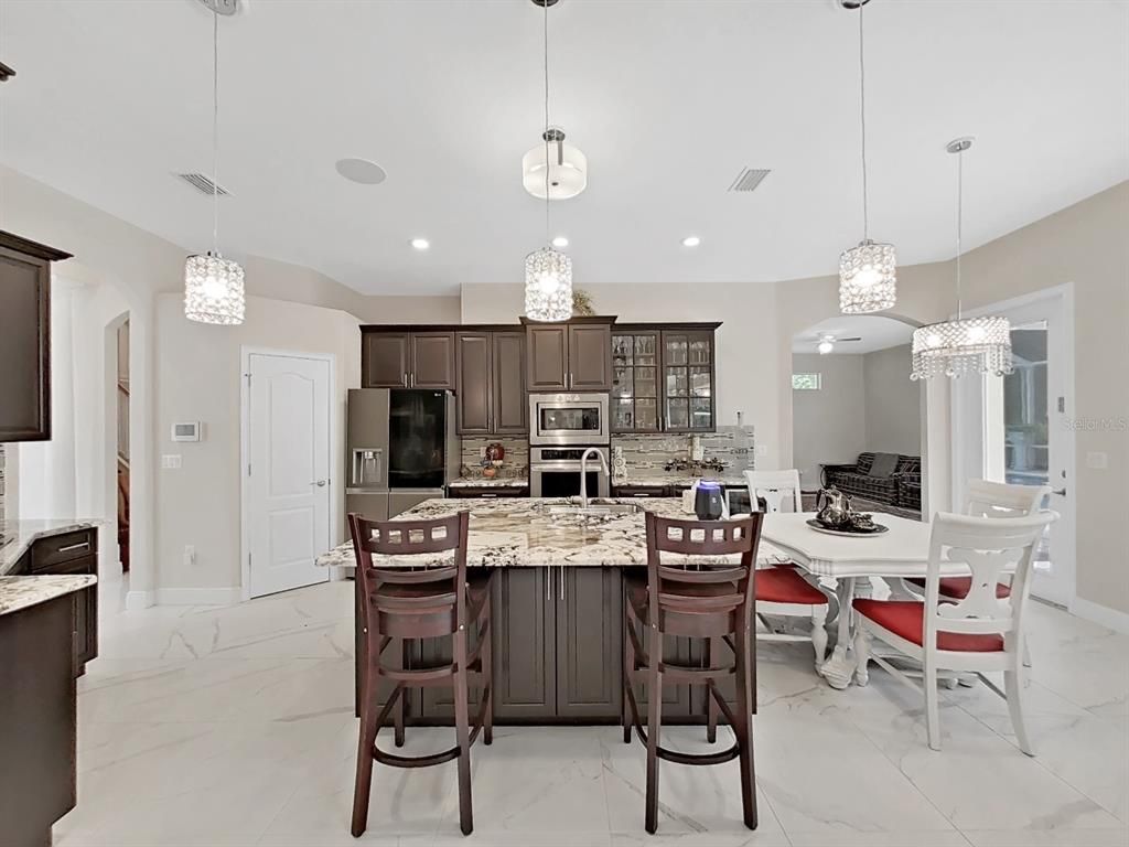 Dining room, Interior, Kitchen, Marble, Pendant Lights, Recessed Lighting, Stainless Steel Appliances