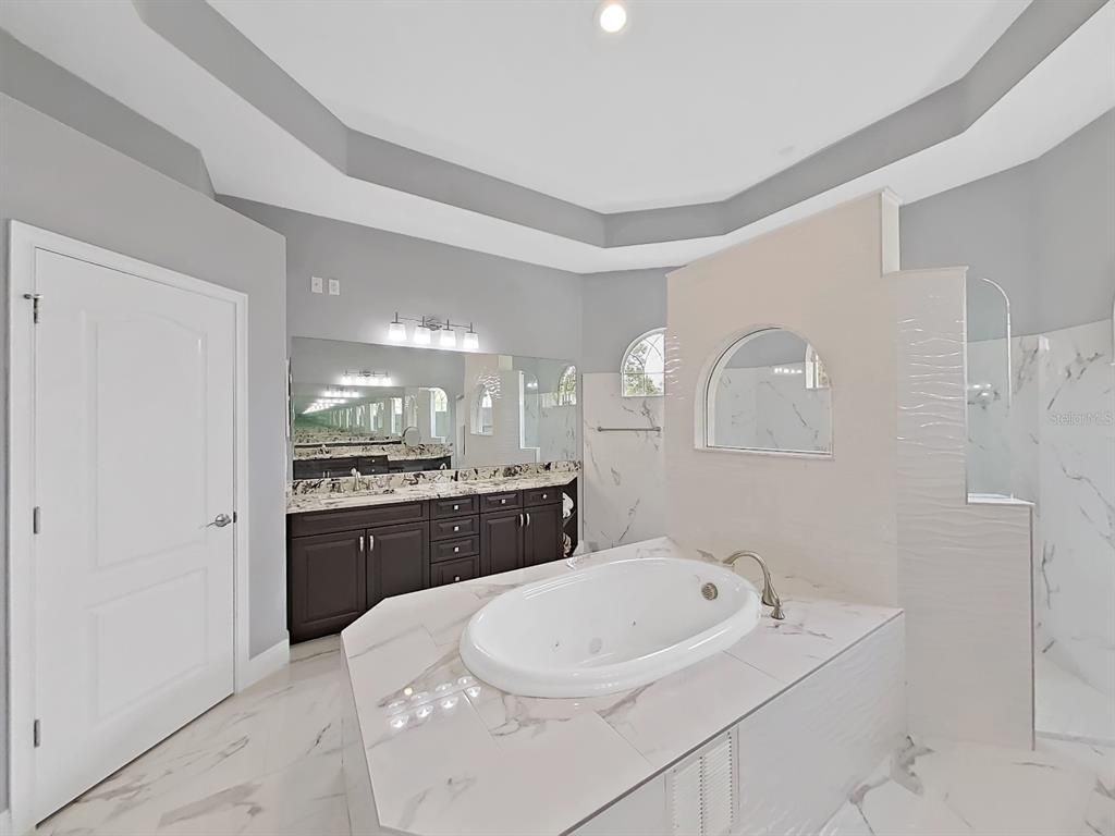 Bathroom, Dual Sink Vanities, Interior, Marble, Marble Walls, Recessed Lighting