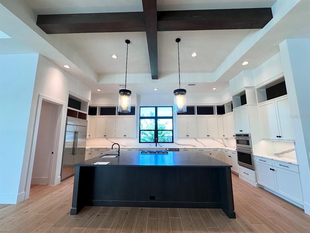 Interior, Kitchen, Pendant Lights, Recessed Lighting, Stainless Steel Appliances, Wooden Beams, Wood Texture Flooring