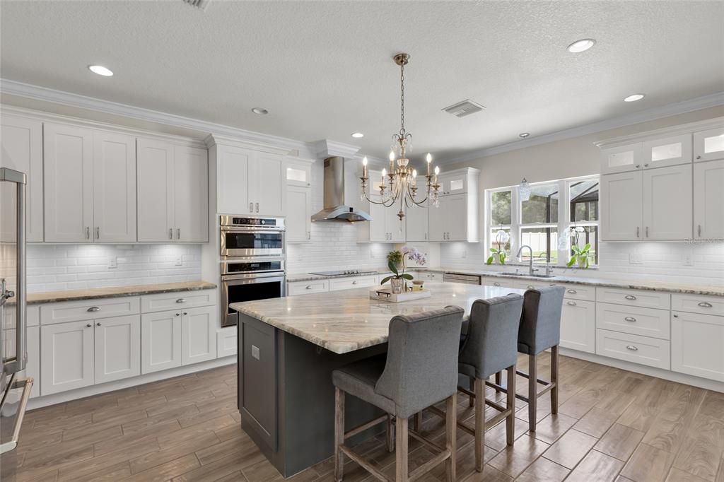 Chandelier, Interior, Kitchen, Recessed Lighting, Stainless Steel Appliances, Wood Texture Flooring