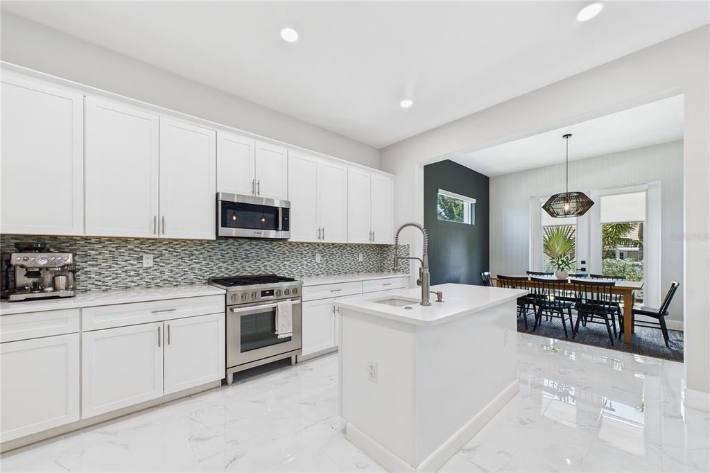 Dining room, Interior, Kitchen, Marble, Pendant Lights, Recessed Lighting, Stainless Steel Appliances