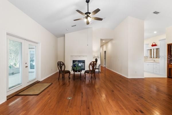Empty room, Fireplace, Interior, Recessed Lighting, Wood Texture Flooring