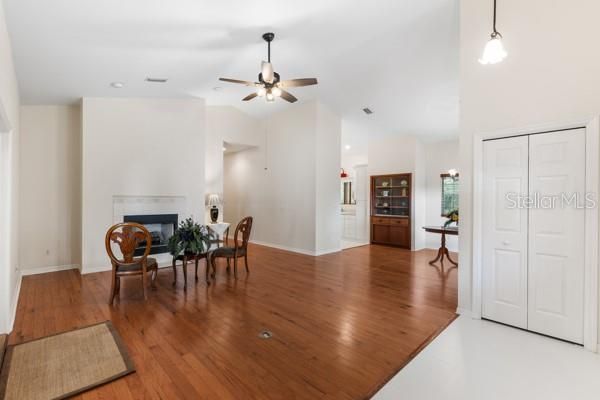 Dining room, Fireplace, Interior, Pendant Lights, Recessed Lighting, Wood Texture Flooring