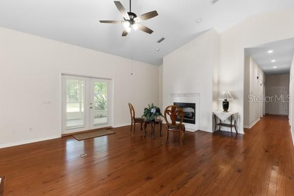 Dining room, Fireplace, Interior, Recessed Lighting, Wood Texture Flooring