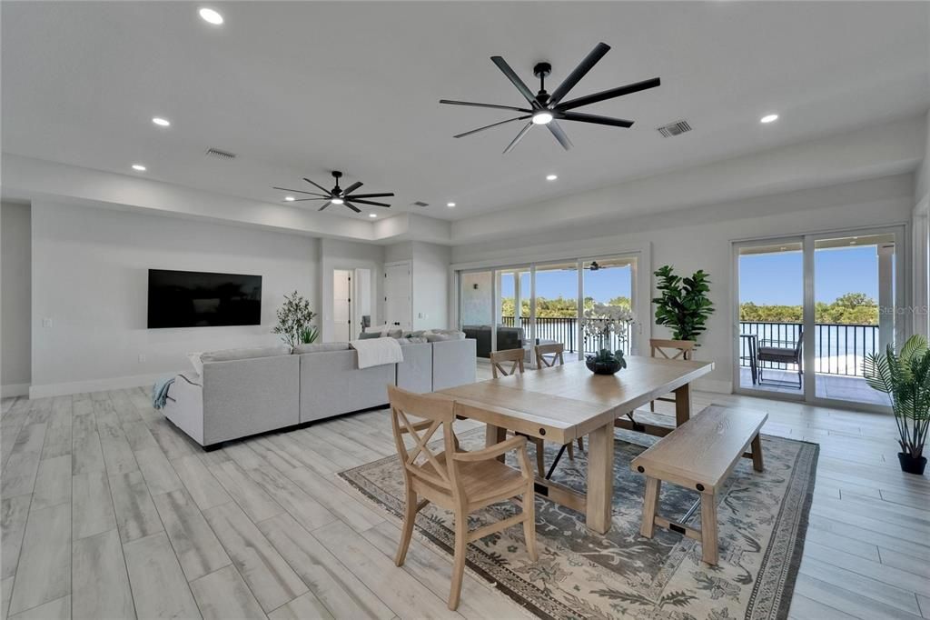 Dining room, Interior, Living room, Recessed Lighting, Water, Wood Texture Flooring