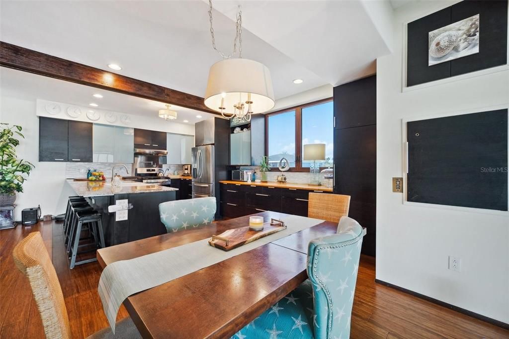 Dining room, Interior, Kitchen, Recessed Lighting, Stainless Steel Appliances, Wood Texture Flooring