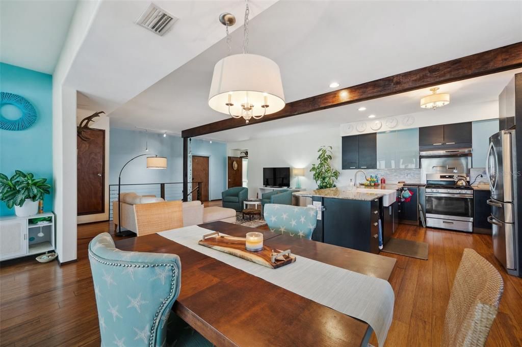 Chandelier, Dining room, Interior, Kitchen, Living room, Recessed Lighting, Stainless Steel Appliances, Wood Texture Flooring
