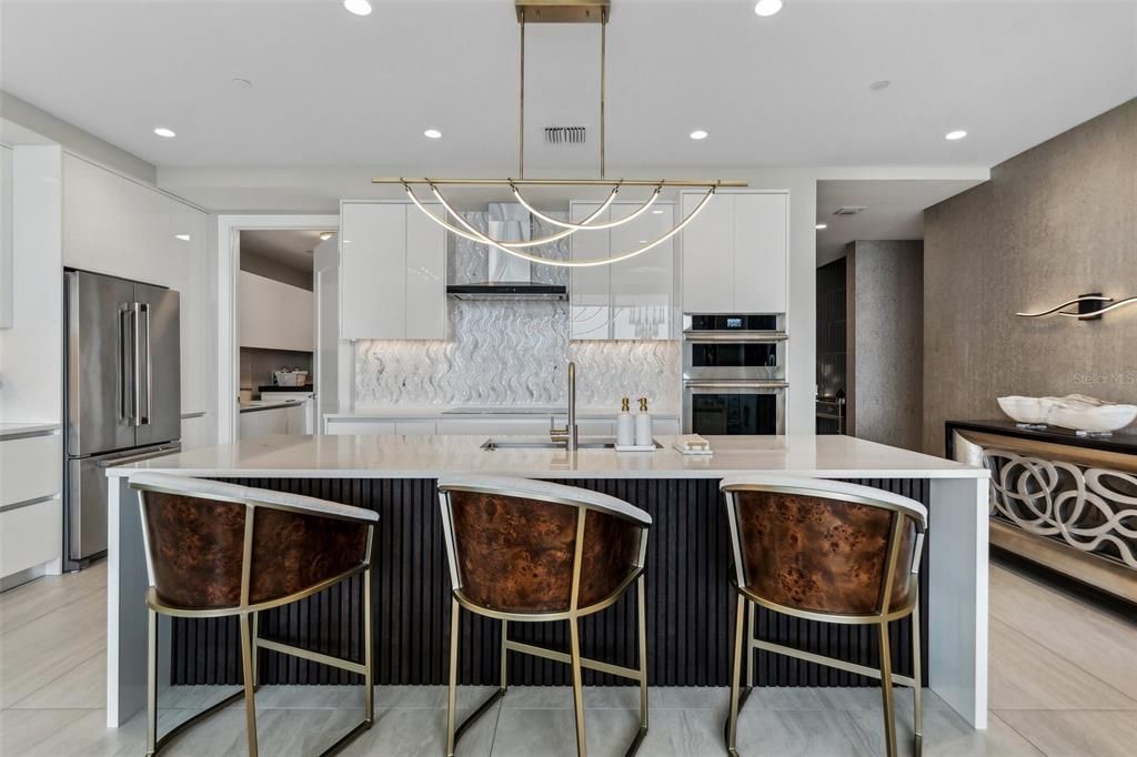 Interior, Kitchen, Marble Walls, Pendant Lights, Recessed Lighting, Stainless Steel Appliances