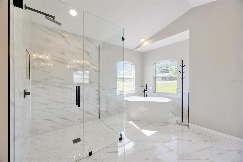 Bathroom, Free Standing Baths, Glass Shower, Interior, Marble, Marble Walls, Recessed Lighting