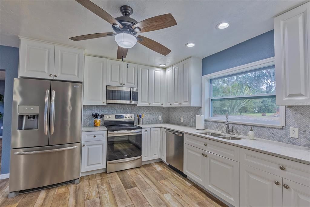 Interior, Kitchen, Recessed Lighting, Stainless Steel Appliances, Wood Texture Flooring