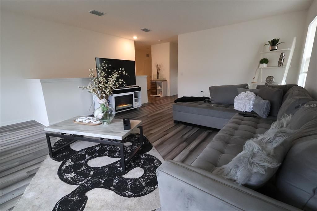 Fireplace, Interior, Living room, Recessed Lighting, Wood Texture Flooring