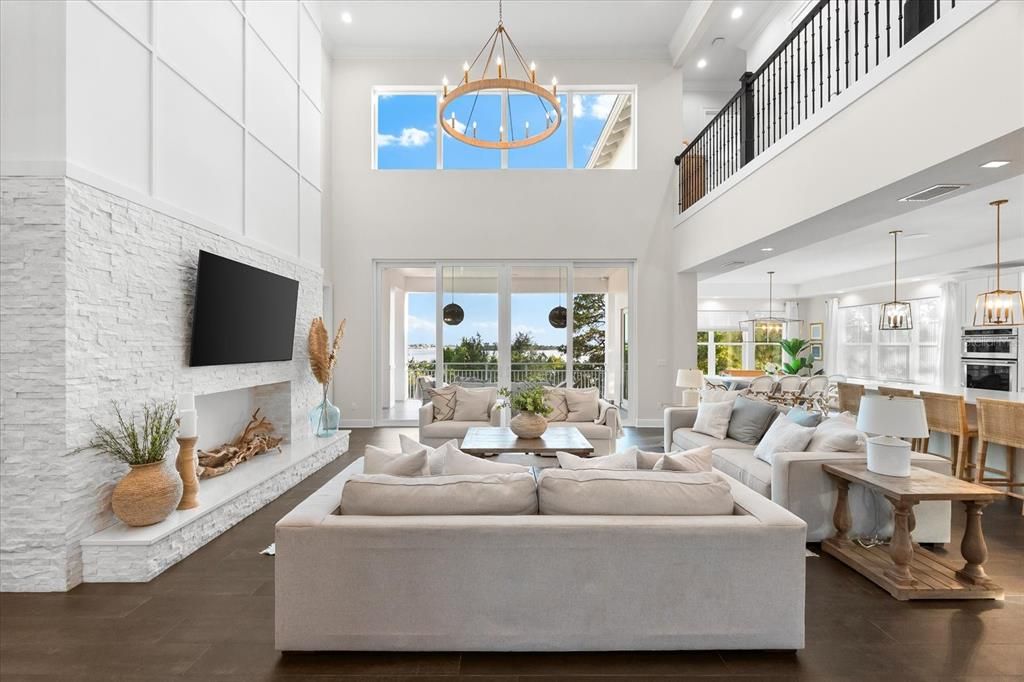 Dining room, Fireplace, Interior, Living room, Pendant Lights, Recessed Lighting, Stone Walls, Wood Texture Flooring