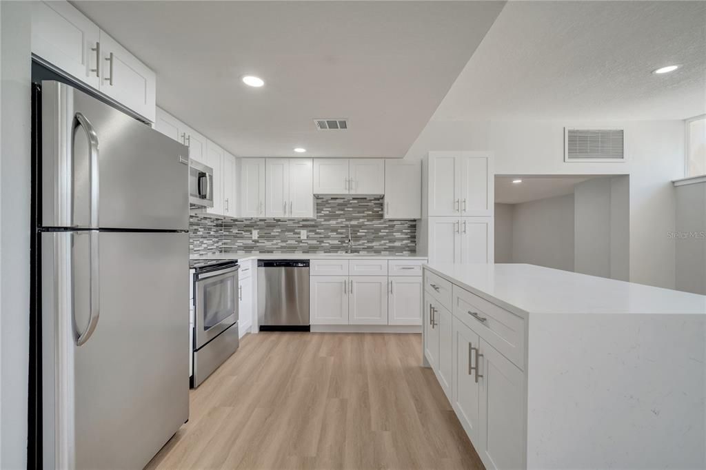 Interior, Kitchen, Recessed Lighting, Stainless Steel Appliances, Wood Texture Flooring