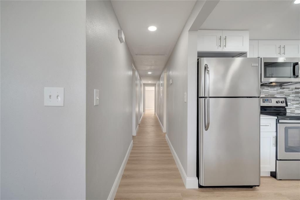 Interior, Kitchen, Recessed Lighting, Stainless Steel Appliances, Wood Texture Flooring