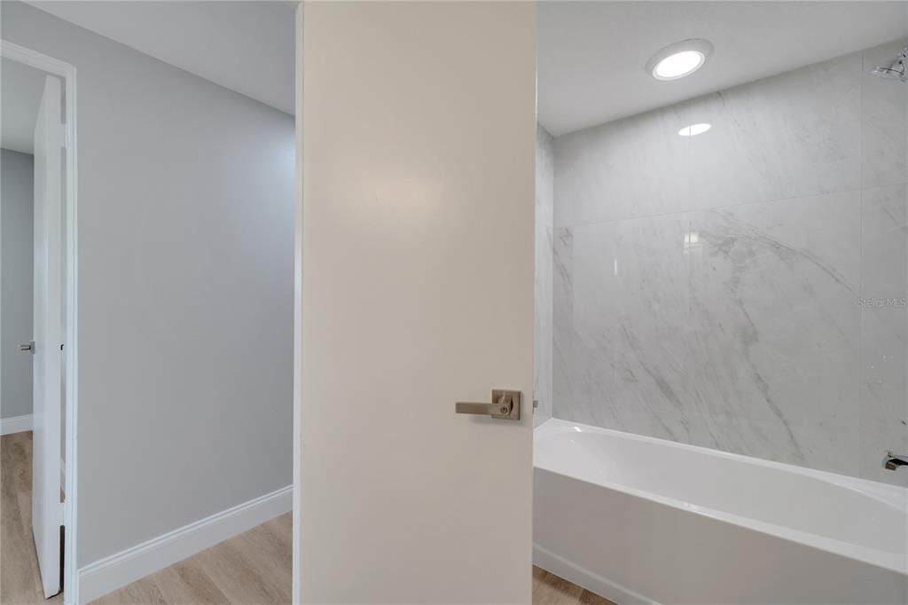 Bathroom, Interior, Marble Walls, Recessed Lighting, Wood Texture Flooring