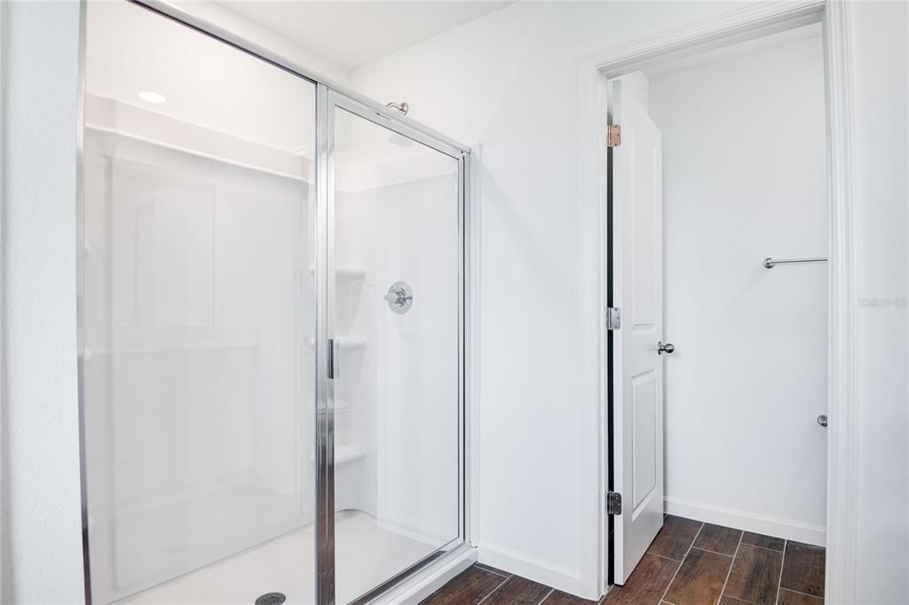 Bathroom, Glass Shower, Interior, Recessed Lighting, Wood Texture Flooring