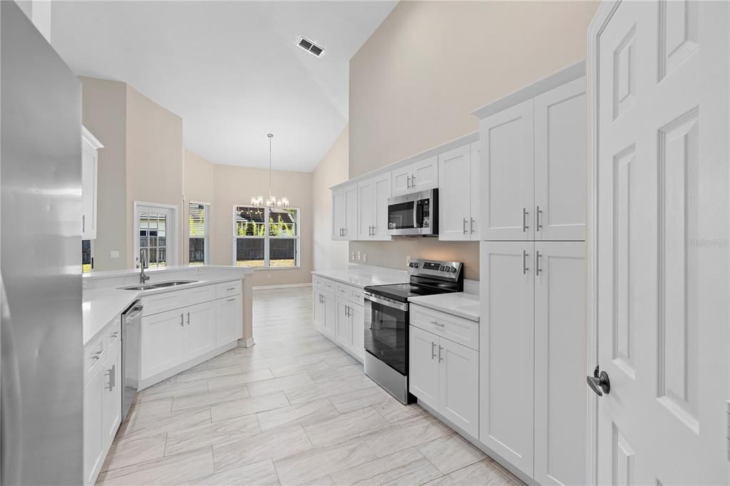 Chandelier, Interior, Kitchen, Marble, Pendant Lights, Stainless Steel Appliances