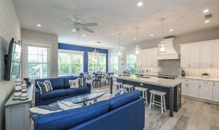 Dining room, Interior, Kitchen, Living room, Pendant Lights, Recessed Lighting, Stainless Steel Appliances, Wood Texture Flooring