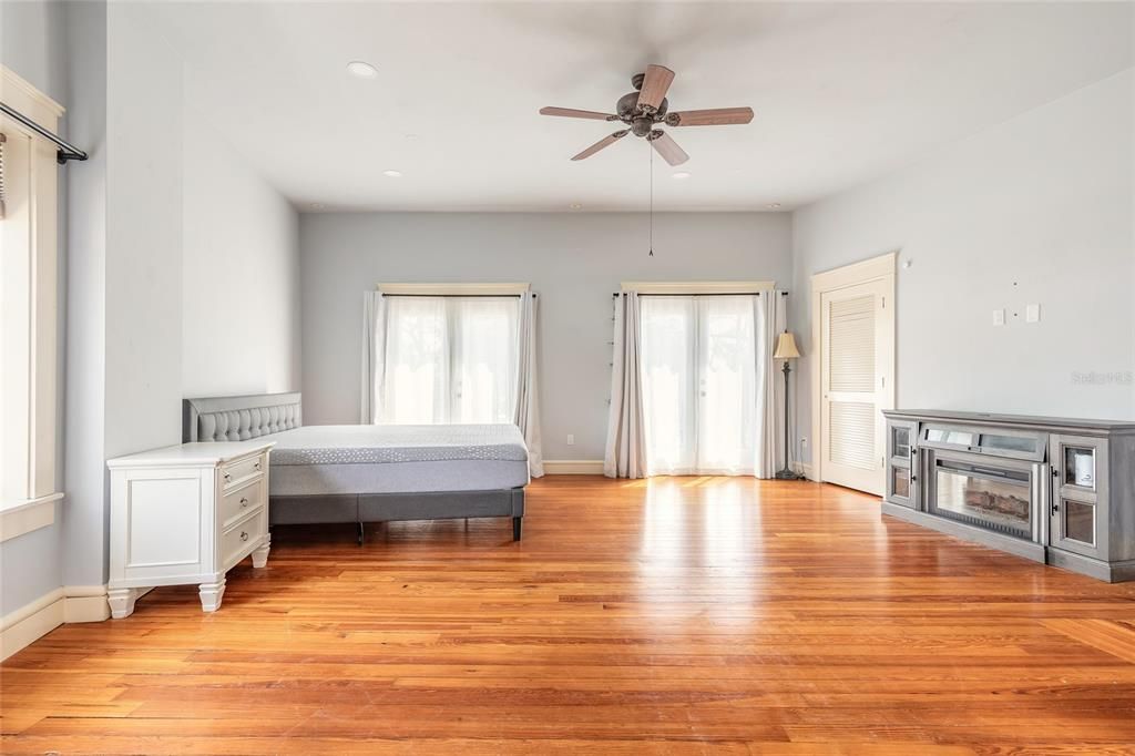 Bedroom, Fireplace, Interior, Recessed Lighting, Wood Texture Flooring