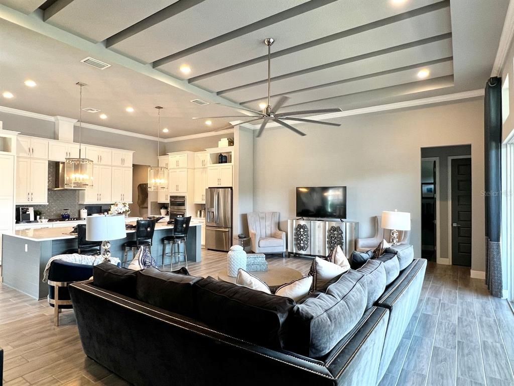 Dining room, Interior, Kitchen, Living room, Pendant Lights, Recessed Lighting, Stainless Steel Appliances, Wood Texture Flooring