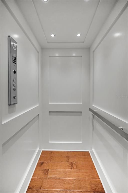 Elevator, Interior, Recessed Lighting, Wood Texture Flooring