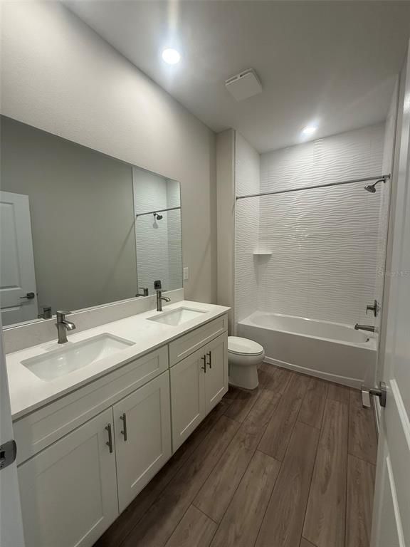 Bathroom, Dual Sink Vanities, Interior, Recessed Lighting, Wood Texture Flooring