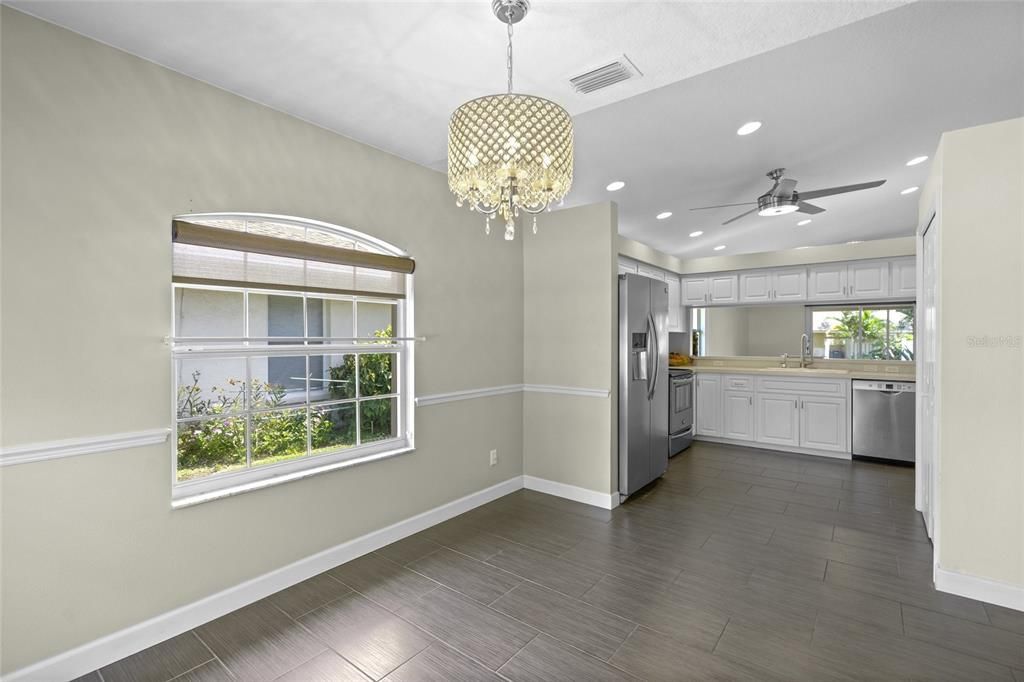 Chandelier, Interior, Kitchen, Recessed Lighting, Stainless Steel Appliances, Wood Texture Flooring