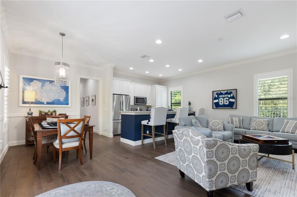 Dining room, Interior, Kitchen, Living room, Pendant Lights, Recessed Lighting, Stainless Steel Appliances, Wood Texture Flooring
