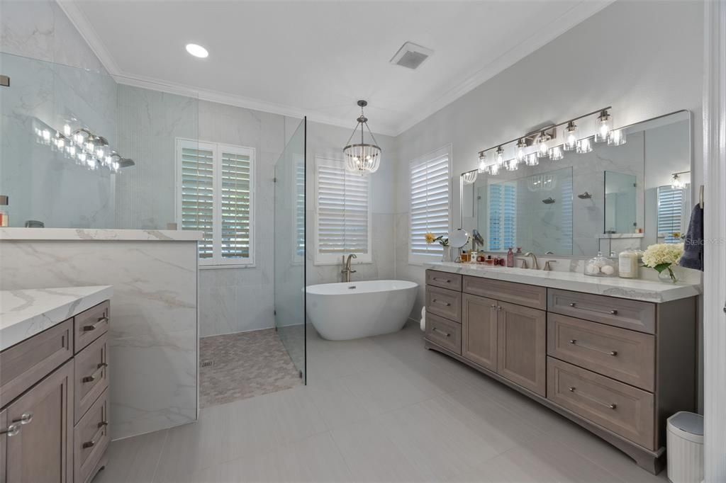 Bathroom, Dual Sink Vanities, Free Standing Baths, Glass Shower, Interior, Marble Walls, Pendant Lights, Recessed Lighting