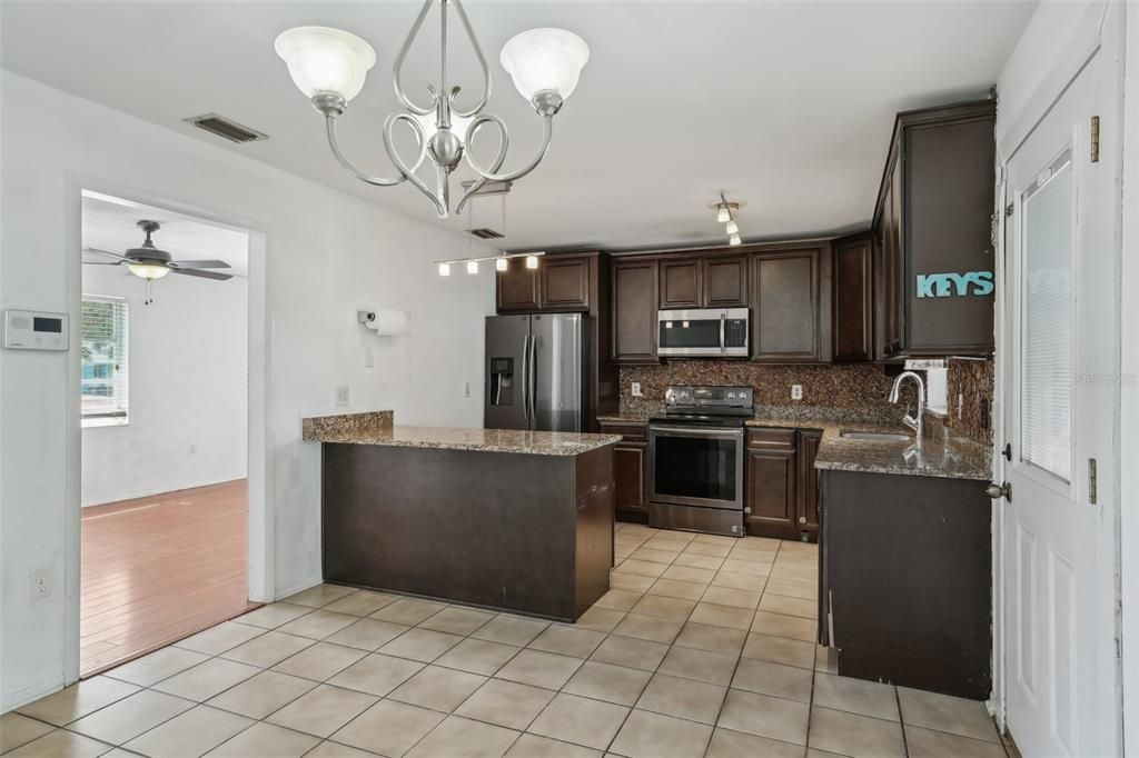 Chandelier, Interior, Kitchen, Stainless Steel Appliances, Wood Texture Flooring