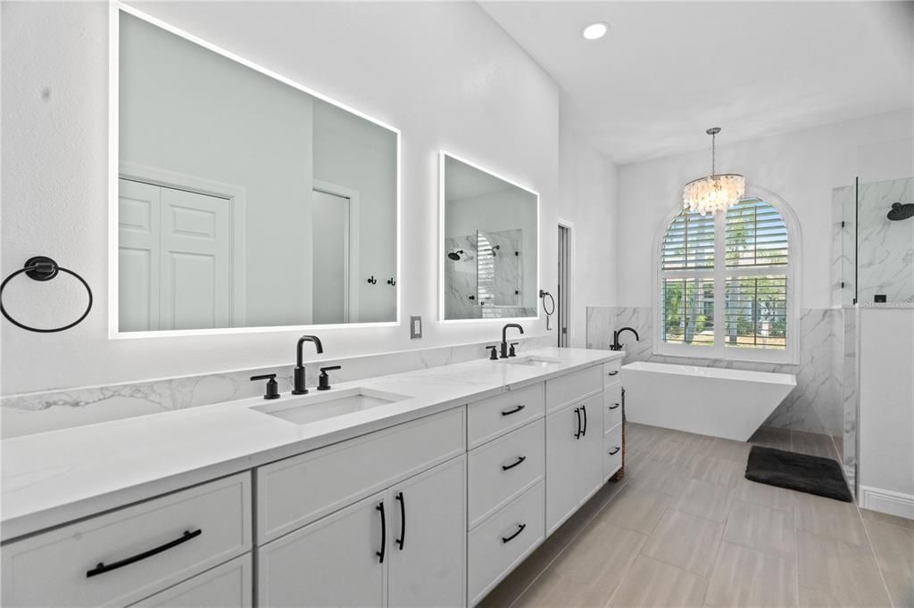 Bathroom, Chandelier, Dual Sink Vanities, Free Standing Baths, Interior, Marble Walls, Recessed Lighting