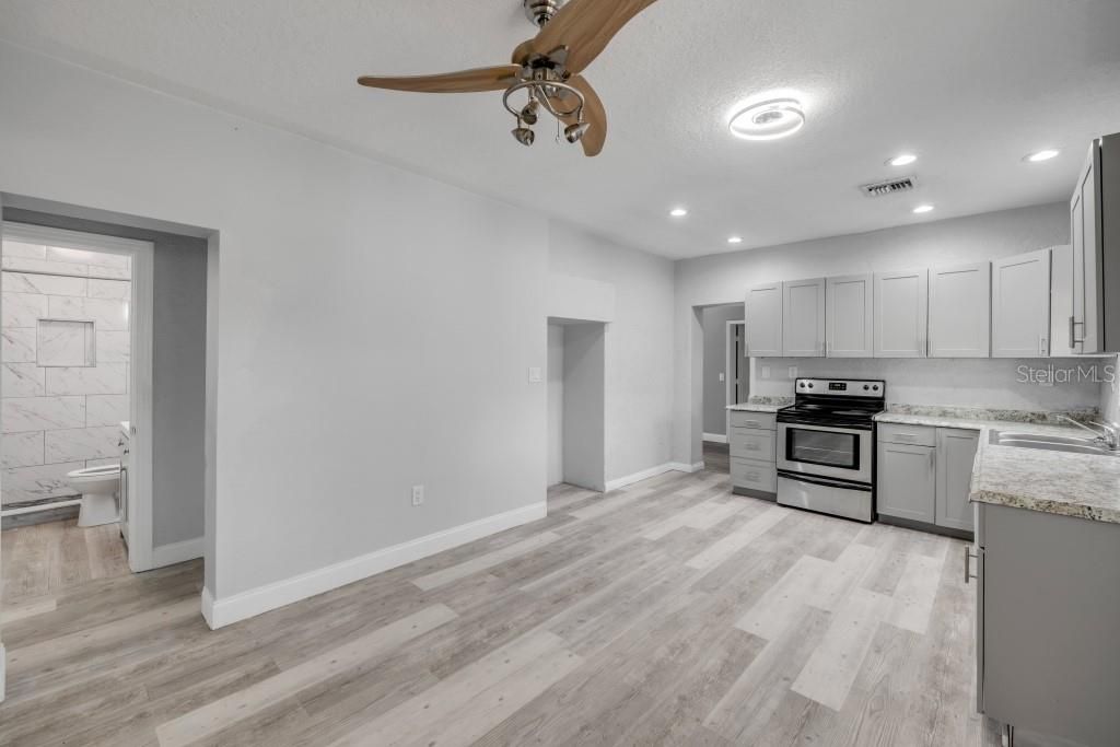 Interior, Kitchen, Recessed Lighting, Stainless Steel Appliances, Wood Texture Flooring