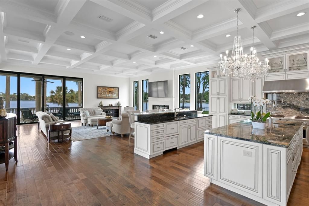 Chandelier, Interior, Kitchen, Living room, Recessed Lighting, Stainless Steel Appliances, Water, Wood Texture Flooring